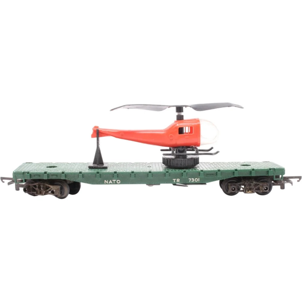 Freelance Transcontinental Flat Car Tri-ang (Green) — Side Elevation Left Direction by Tri-ang